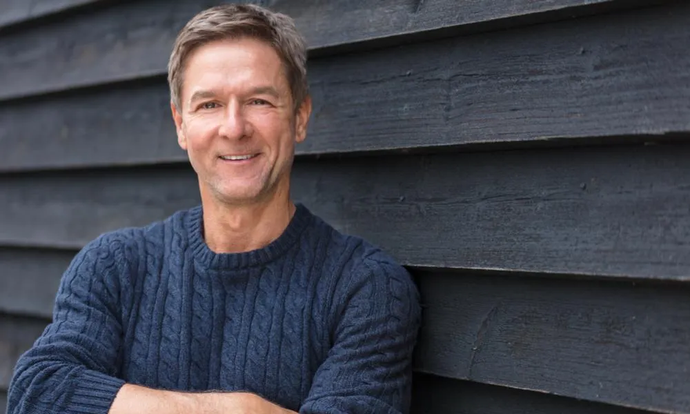 middle aged man with toupee